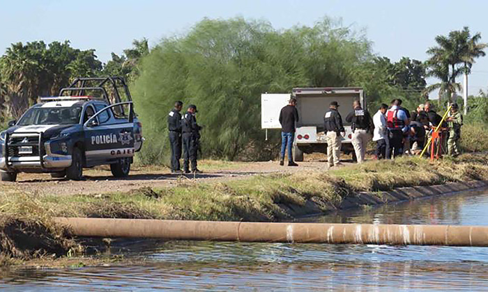 Hallan a mujer asesinada en aguas de un canal en Cócorit
