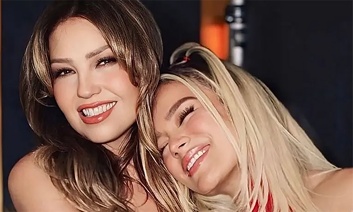 Hereda Thalía el título de “tropicoqueta” a Karol G